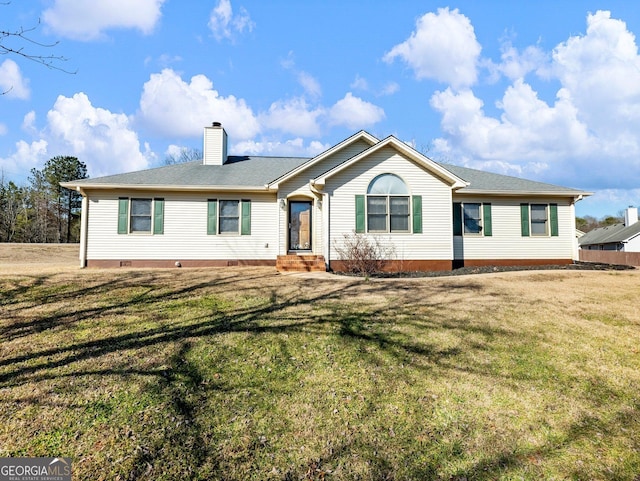 ranch-style home featuring a front yard