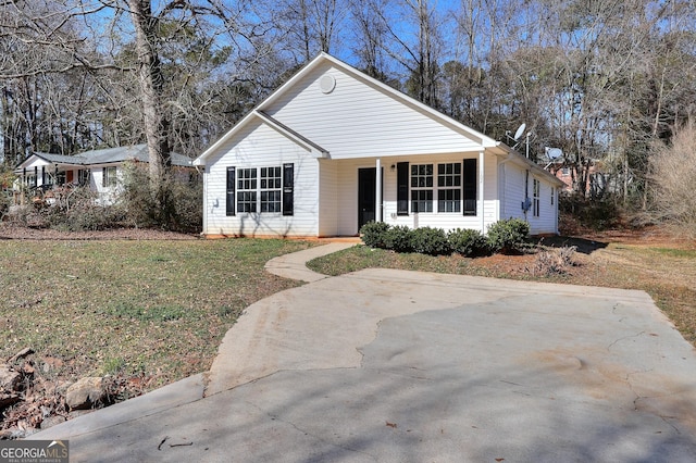 ranch-style home with a front yard