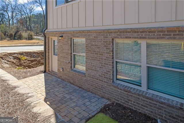 view of property exterior featuring a patio