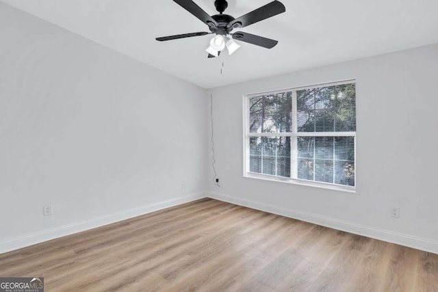 unfurnished room with ceiling fan and light hardwood / wood-style floors