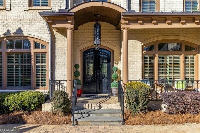 entrance to property featuring french doors