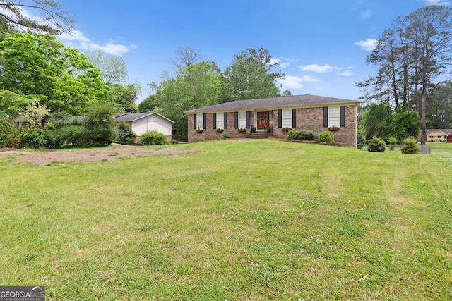 ranch-style home with a front lawn