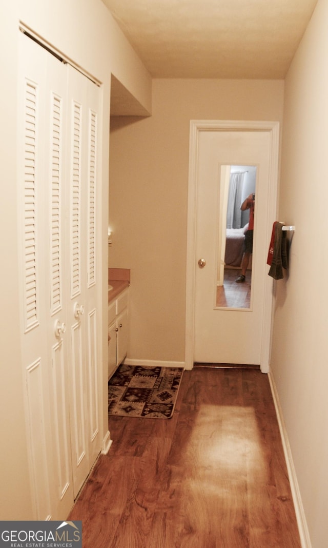 hall featuring dark hardwood / wood-style flooring