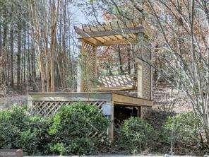 view of home's exterior with a pergola