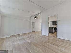 interior space featuring ceiling fan and light wood-type flooring