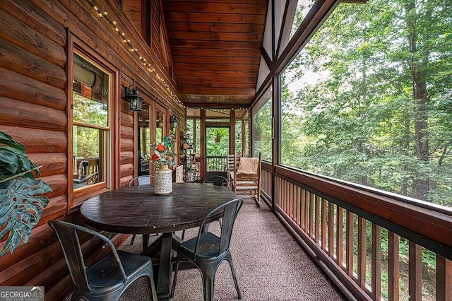 sunroom / solarium featuring a healthy amount of sunlight