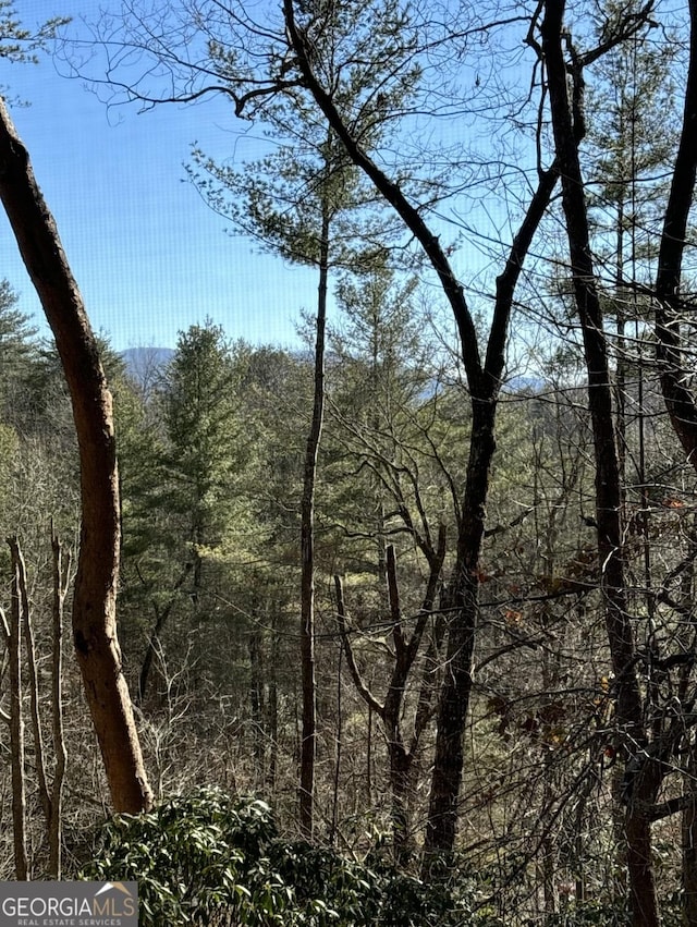 view of landscape featuring a view of trees