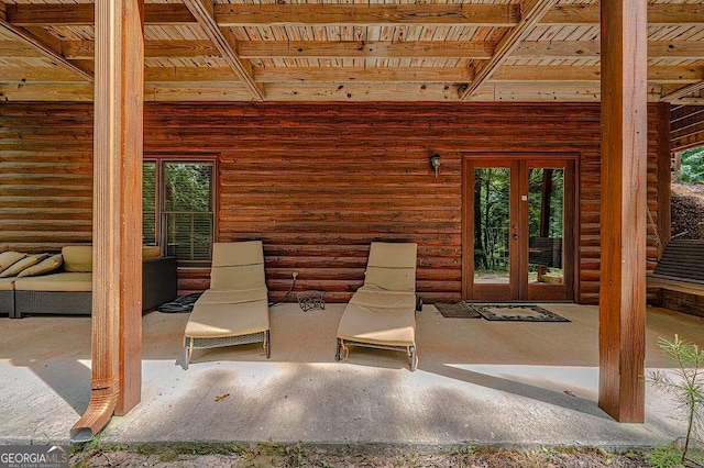 view of patio featuring french doors