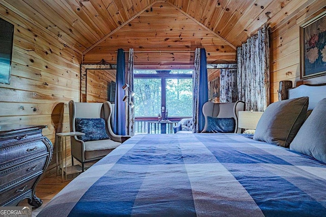 bedroom with wooden walls, wooden ceiling, and vaulted ceiling