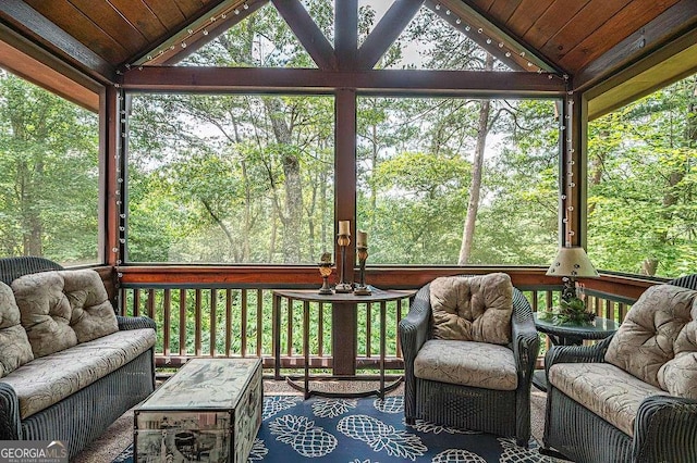 sunroom with wood ceiling and vaulted ceiling