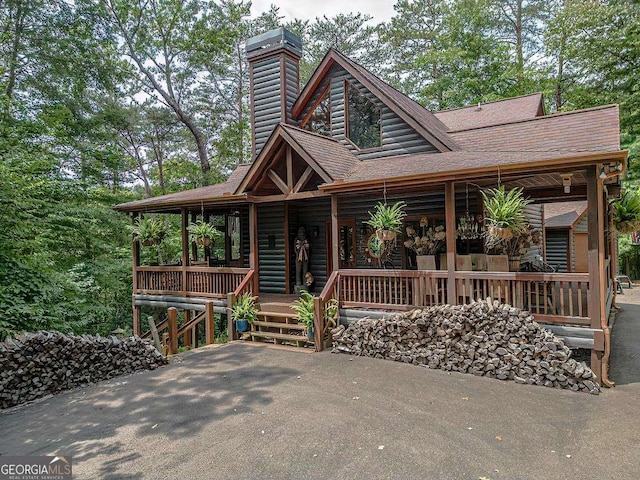 log home with a porch