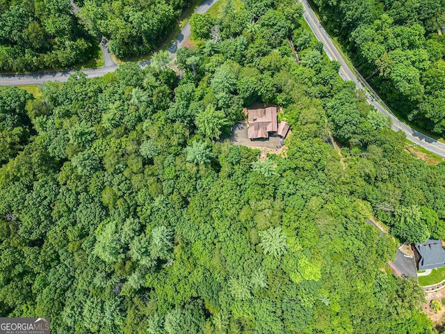 aerial view featuring a forest view