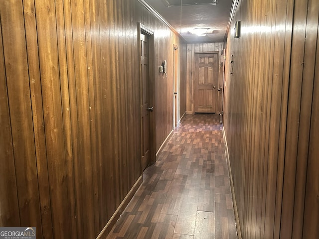 6100 White House Pkwy, Warm Springs, GA 31830 - hallway with wooden walls, attic access, and dark wood finished floors