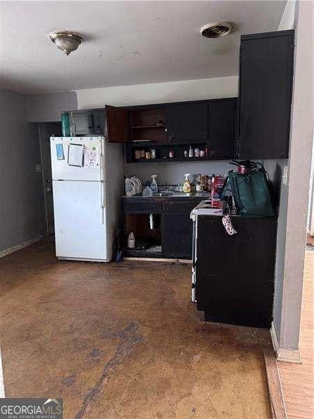 kitchen with white fridge