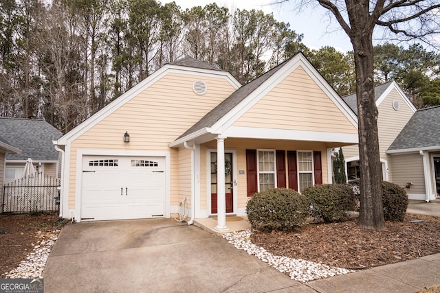 view of front of house with a garage and covered porch