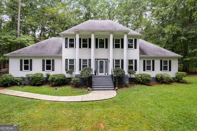 view of front of home featuring a front lawn