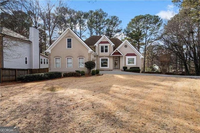 view of front property with a front lawn