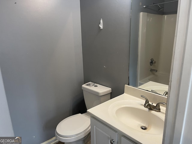 full bathroom with vanity, shower / washtub combination, and toilet