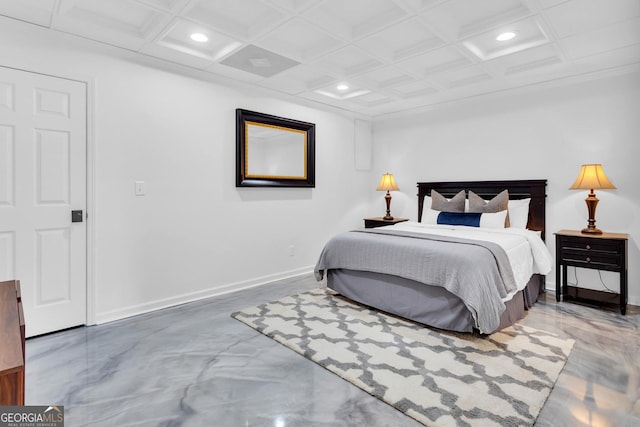 bedroom with coffered ceiling and concrete floors