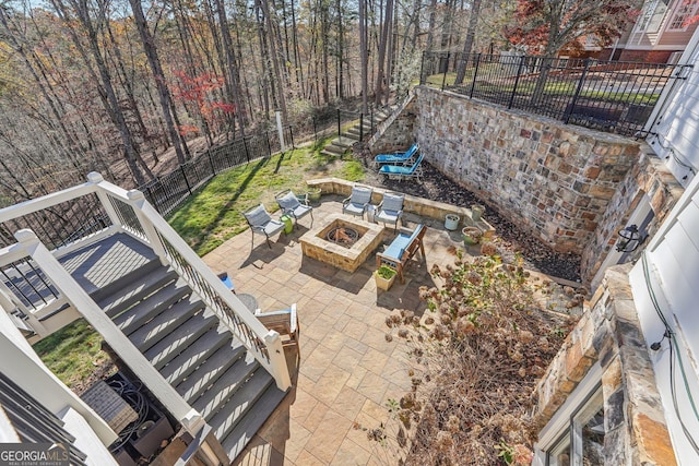 view of patio with an outdoor fire pit