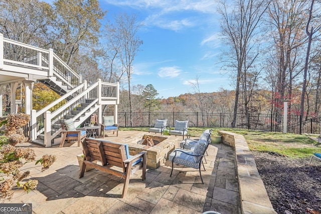 view of patio featuring a fire pit