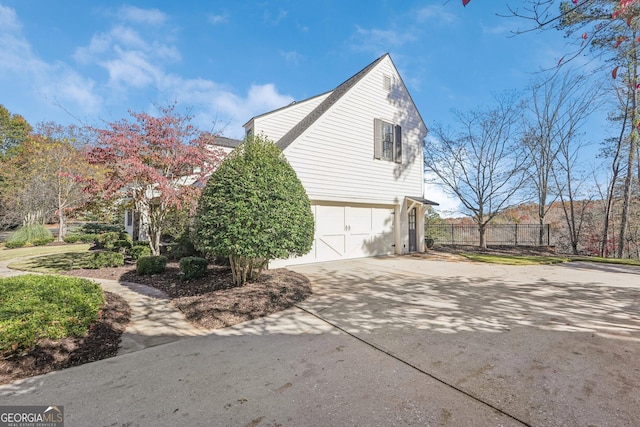 view of home's exterior with a garage