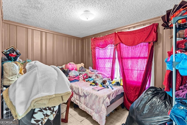 bedroom featuring a textured ceiling