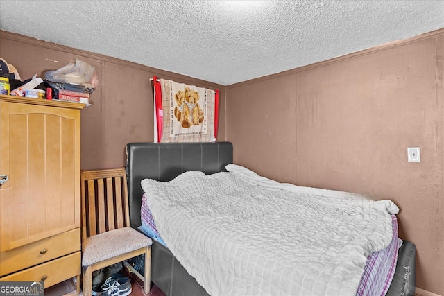 bedroom featuring a textured ceiling