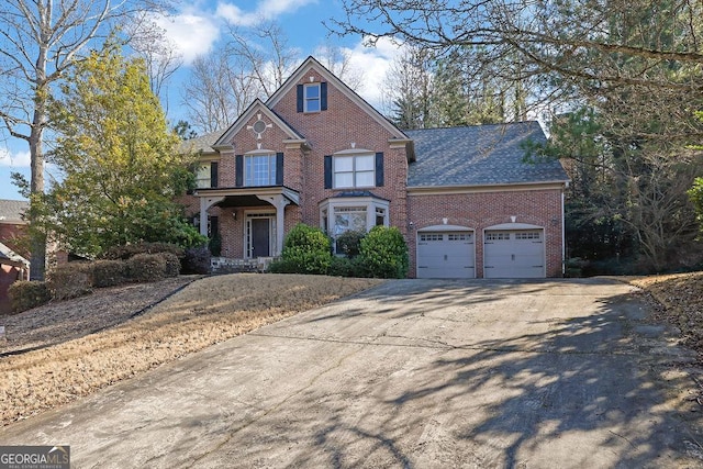 view of front of property with a garage