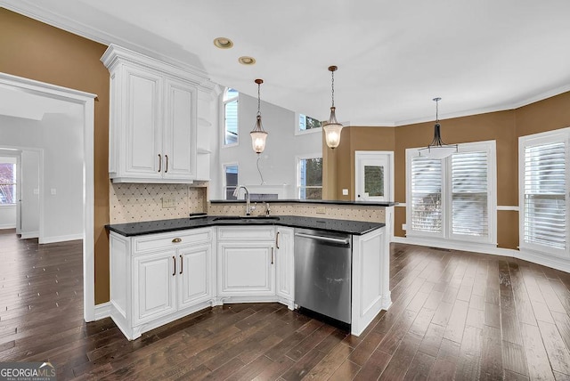 kitchen with dishwasher, sink, hanging light fixtures, and white cabinets