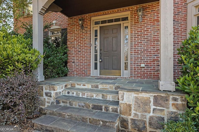 property entrance featuring covered porch