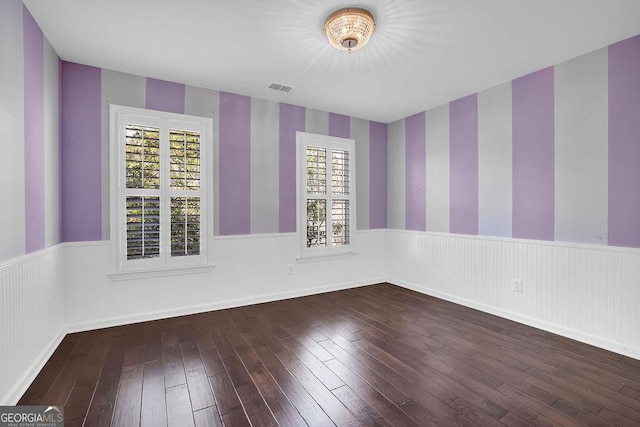 empty room featuring dark hardwood / wood-style floors