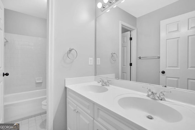 full bathroom featuring vanity,  shower combination, and toilet