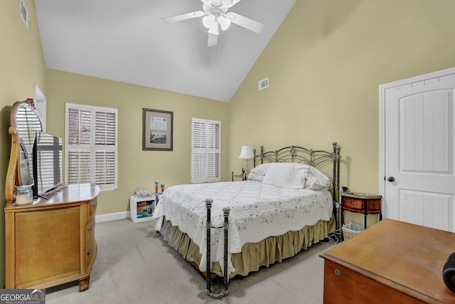 bedroom with light colored carpet, visible vents, a ceiling fan, high vaulted ceiling, and baseboards