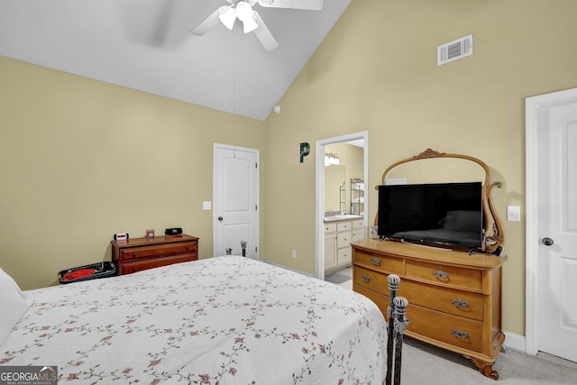 bedroom featuring visible vents, a ceiling fan, light carpet, connected bathroom, and high vaulted ceiling