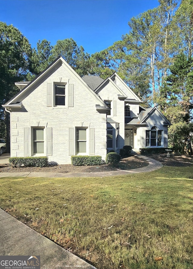 front of property with a front yard