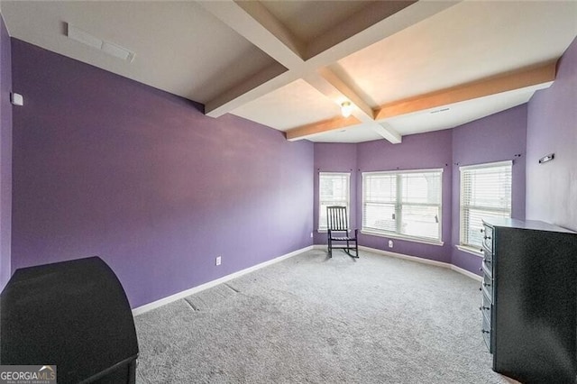 living area with beamed ceiling, coffered ceiling, and carpet flooring