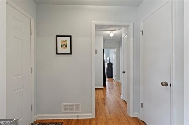 hallway featuring light hardwood / wood-style flooring