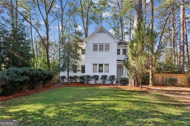 view of front of home with a front yard