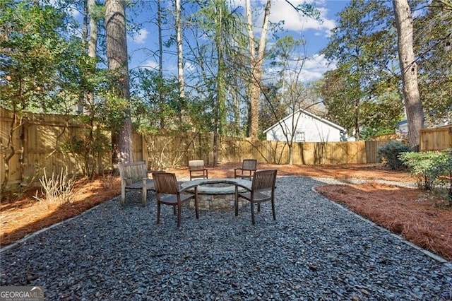 view of yard featuring a fire pit