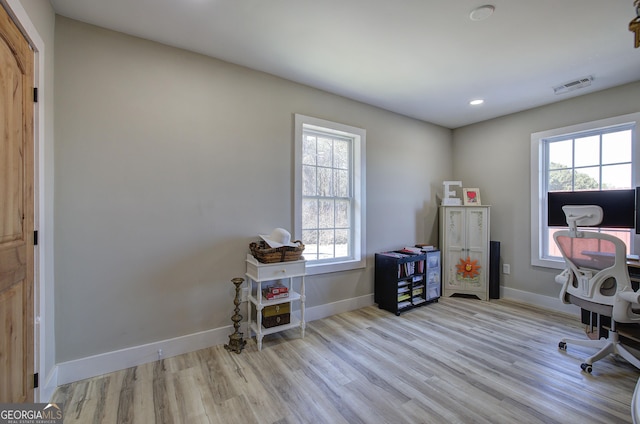 office area featuring recessed lighting, visible vents, baseboards, and wood finished floors