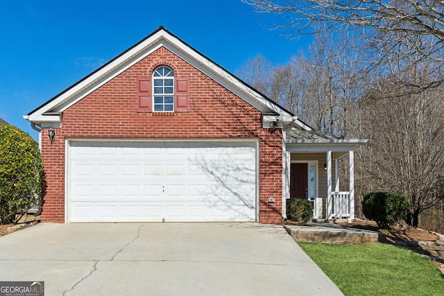 view of front of home with a garage and covered porch