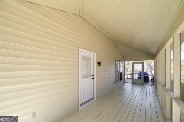 wooden terrace featuring a porch