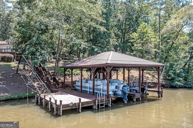 view of dock featuring a water view and boat lift