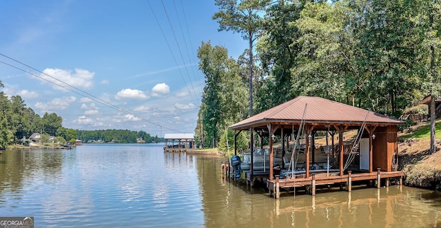 dock area with a water view