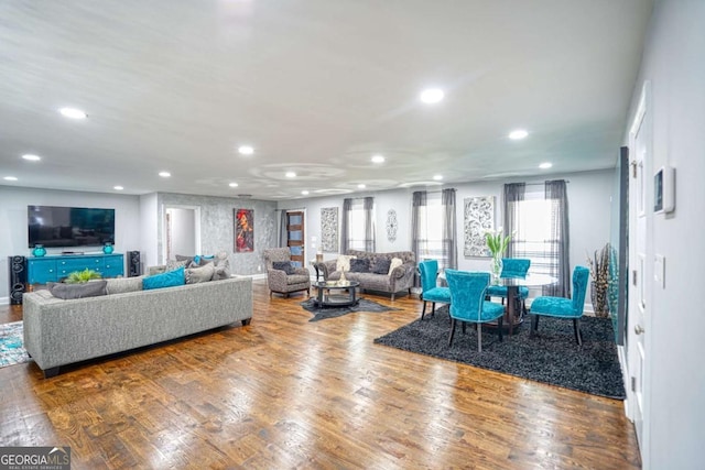 living room featuring recessed lighting and wood finished floors