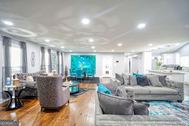 living room featuring wood finished floors and recessed lighting