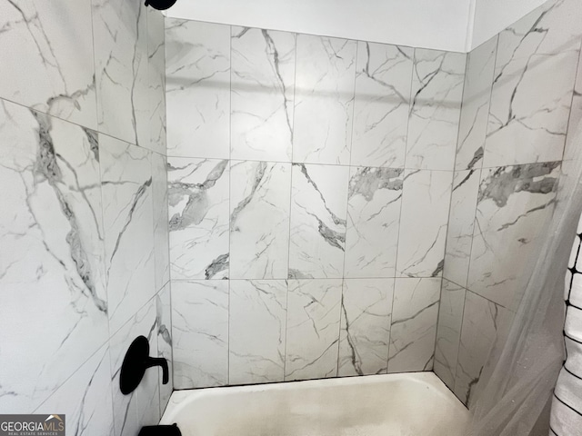 bathroom featuring bathing tub / shower combination