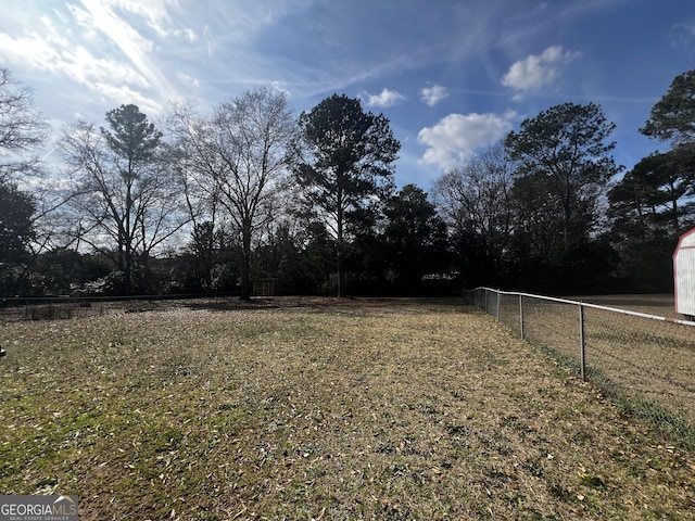 view of yard with fence