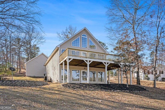 view of front of property with a wooden deck